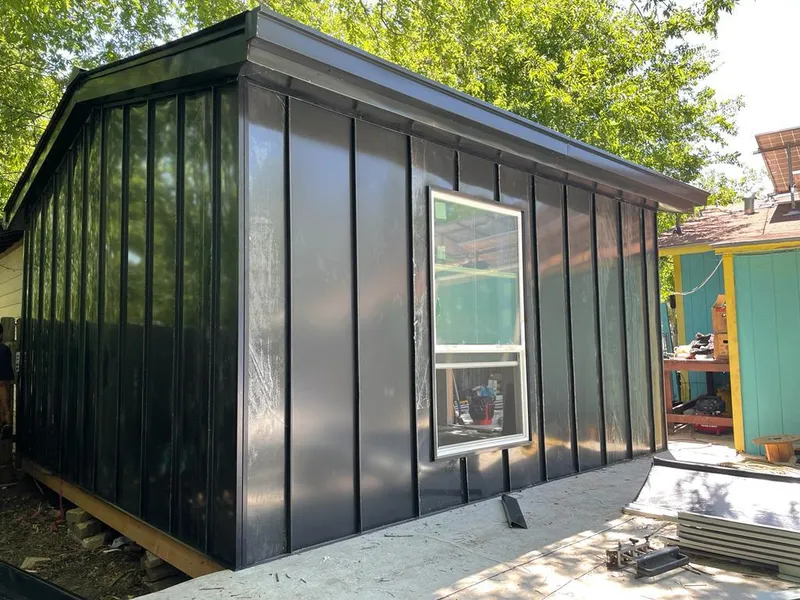 Black standing seam metal wall panels for Metal Roof Installation in Fort Atkinson