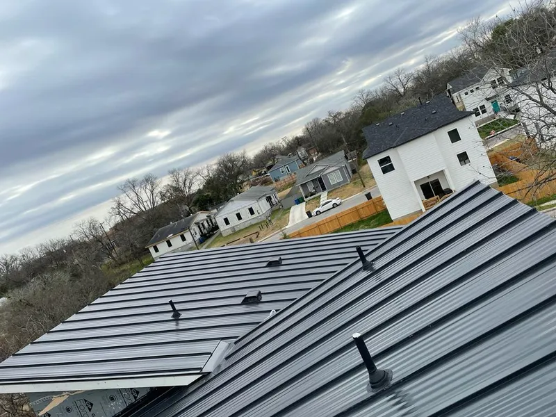 Standing seam metal roof panels with vents for Skylight Repair in Fort Atkinson